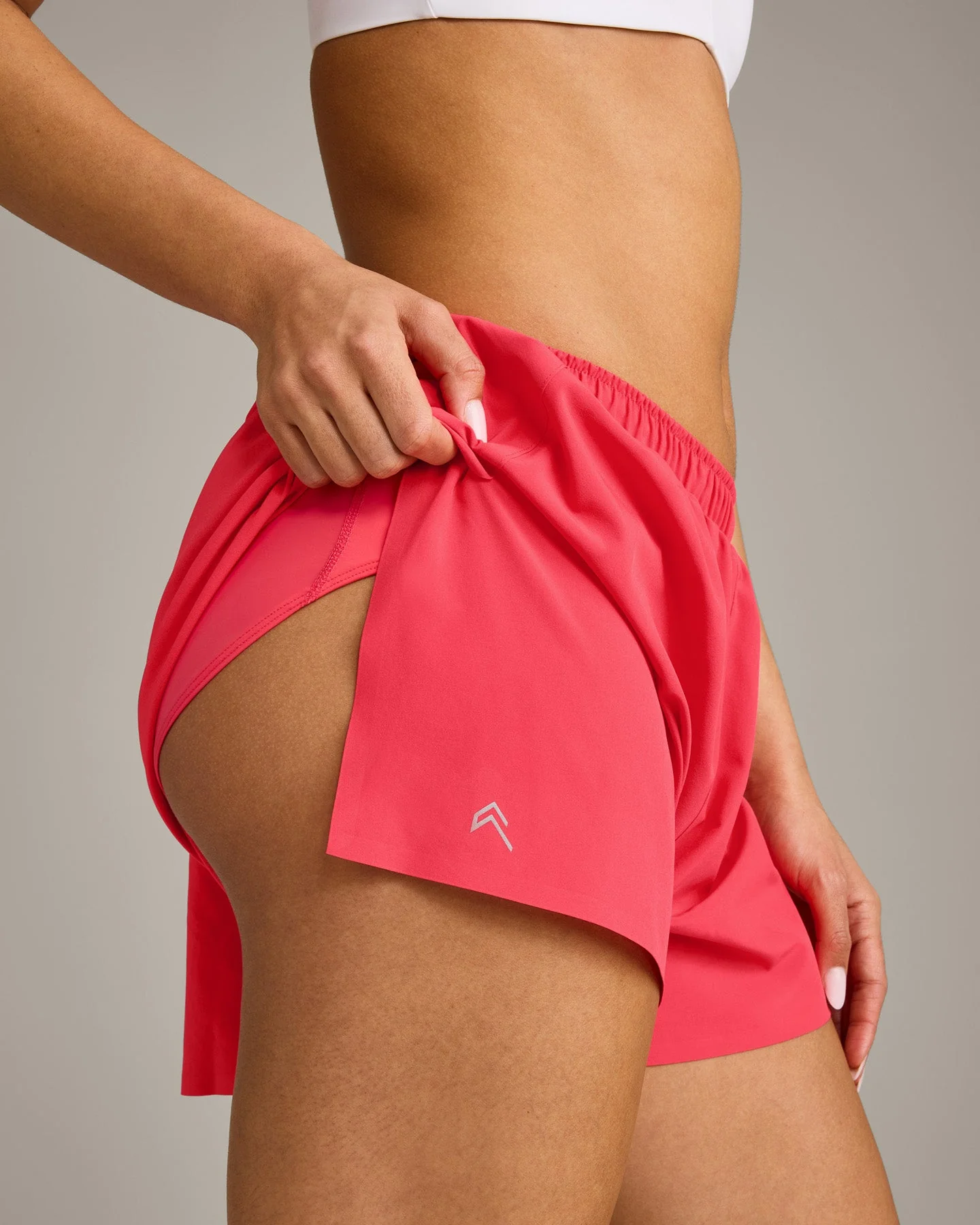 AirMove™ Lined Shorts 4" with Pocket and Reflective Logo | Charged Pink - Image 5