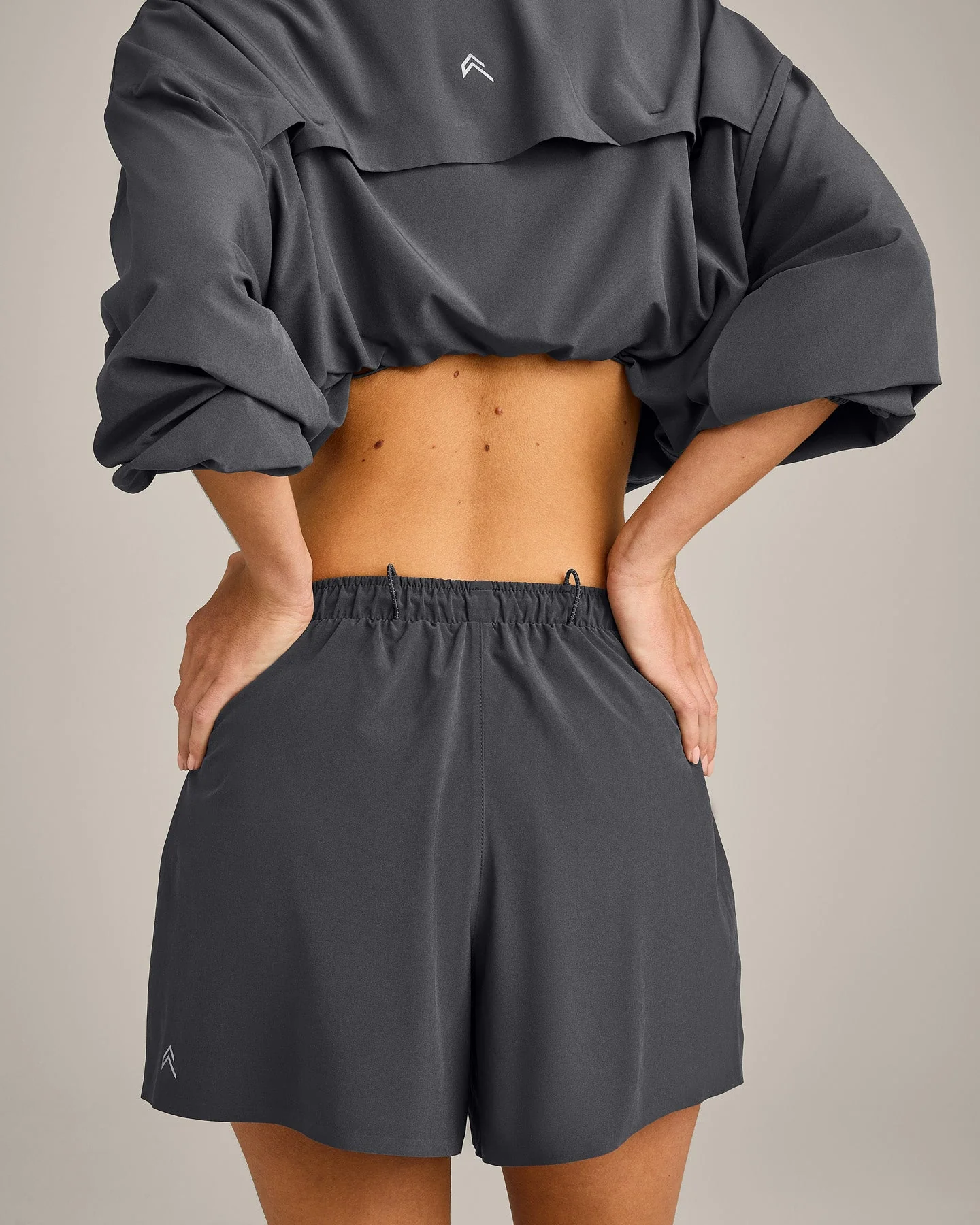 AirMove™ Lined Shorts 4" with Pocket and Reflective Logo | Coal - Image 5