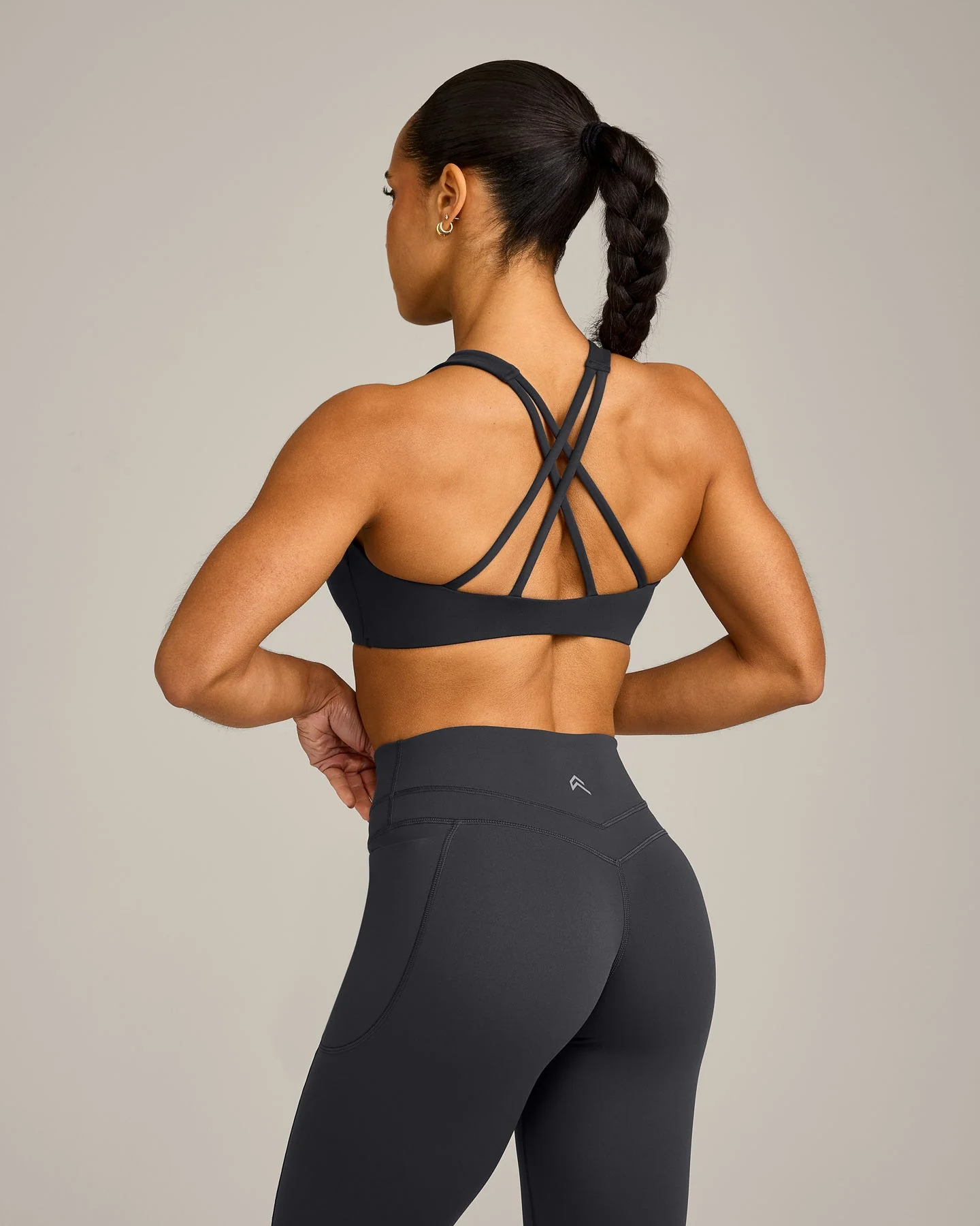 EasyLift™ High Neck Sports Bra with Grey Logo | Coal - Image 2