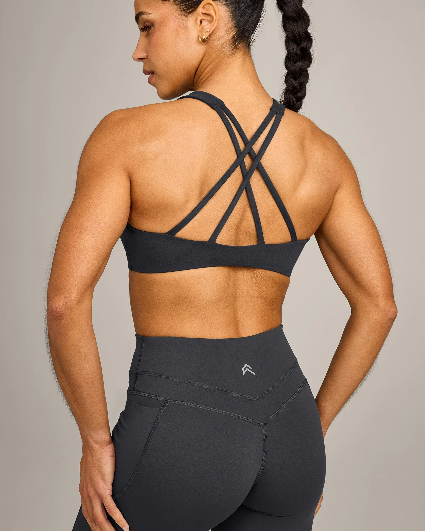 EasyLift™ High Neck Sports Bra with Grey Logo | Coal - Image 4