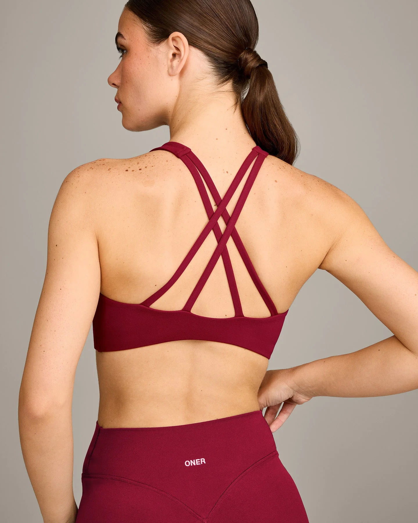 EasyLift™ High Neck Sports Bra with Grey Logo | Ruby Red - Image 4