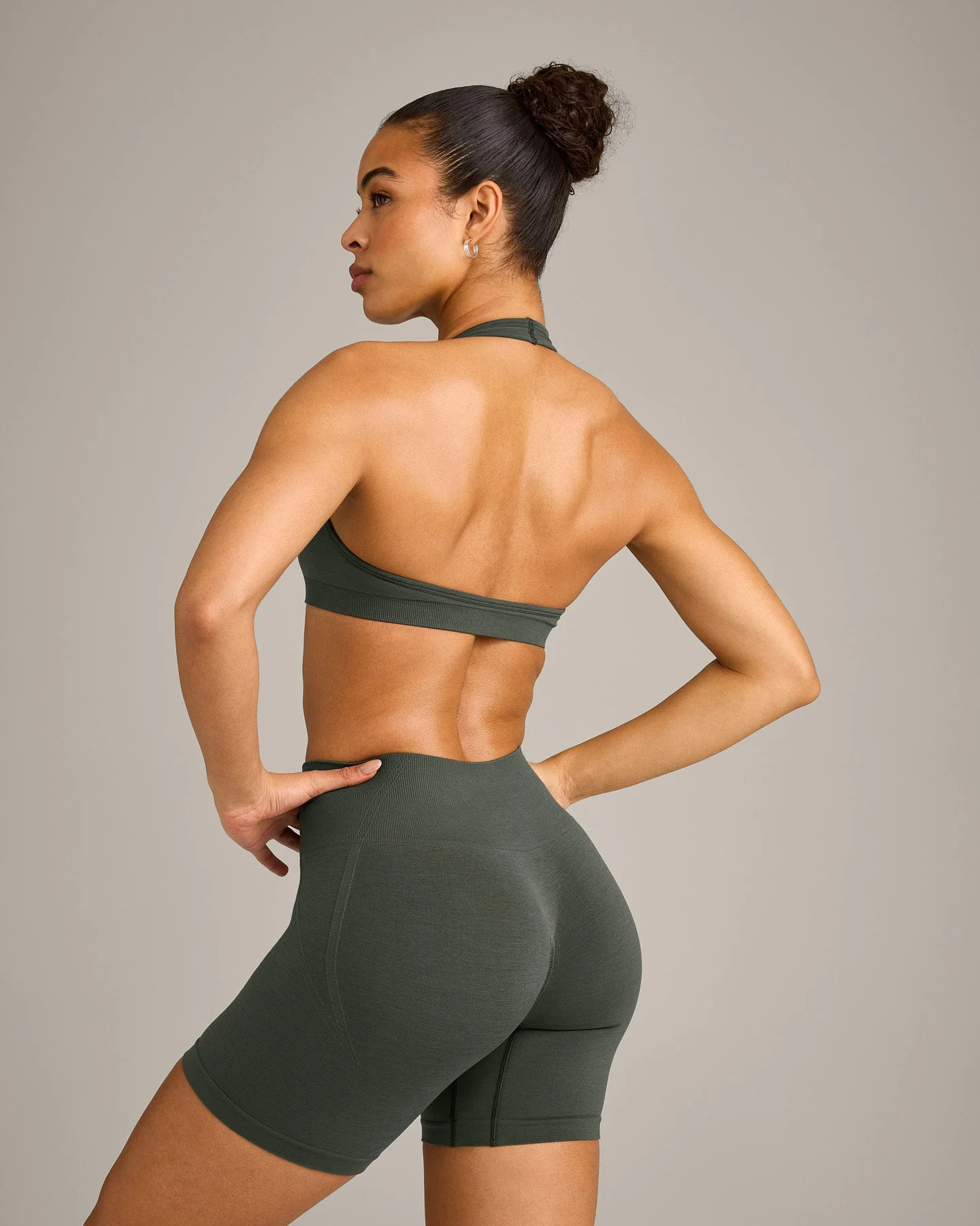 EffortlessLift™ Seamless Halter Neck Sports Bra with Grey Logo | Dark Khaki - Image 6