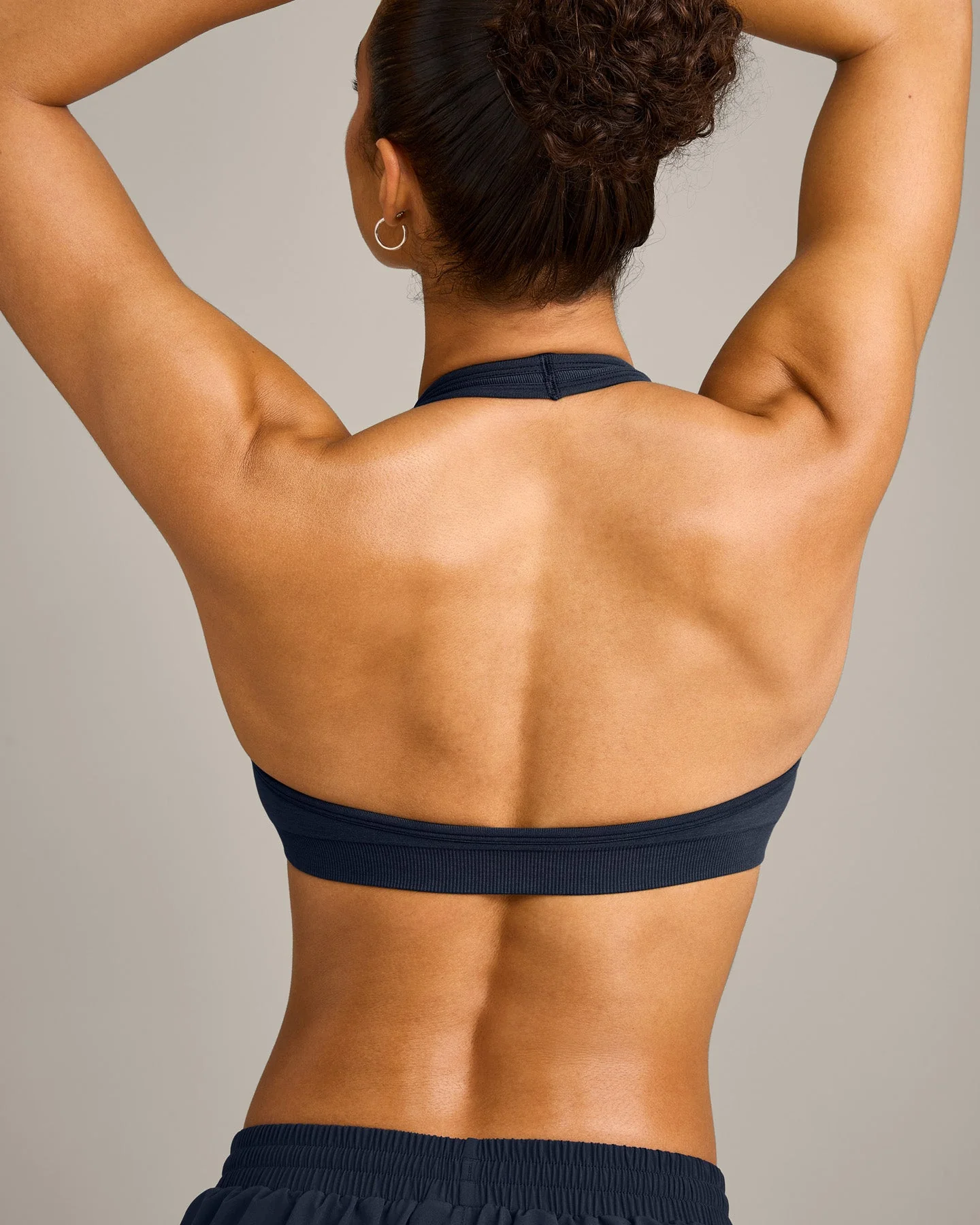 EffortlessLift™ Seamless Halter Neck Sports Bra with Grey Logo | True Blue - Image 4