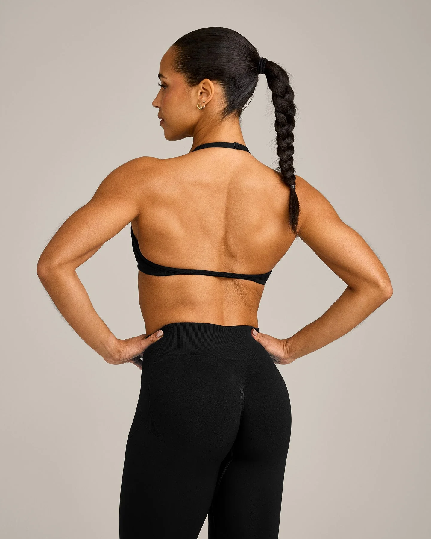 EnhanceLift™ Seamless Minimal Halter Neck Bralette with Grey Logo | Black - Image 6