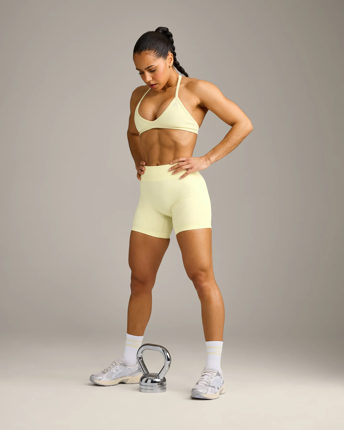 EnhanceLift™ Seamless Minimal Halter Neck Bralette with Grey Logo | Pastel Yellow - Image 6