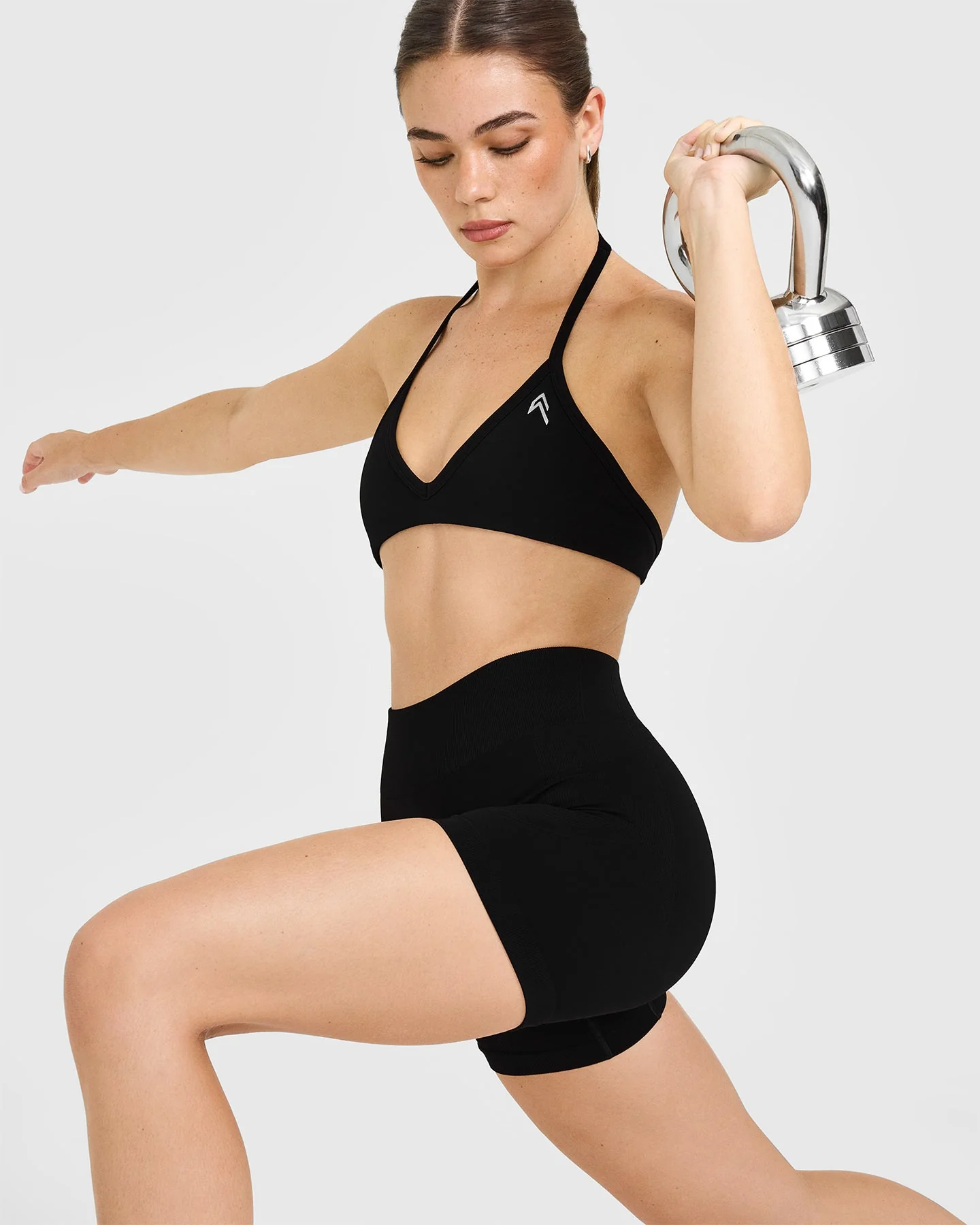 EnhanceLift™ Seamless Minimal Halter Neck Bralette with White Logo | Black - Image 6
