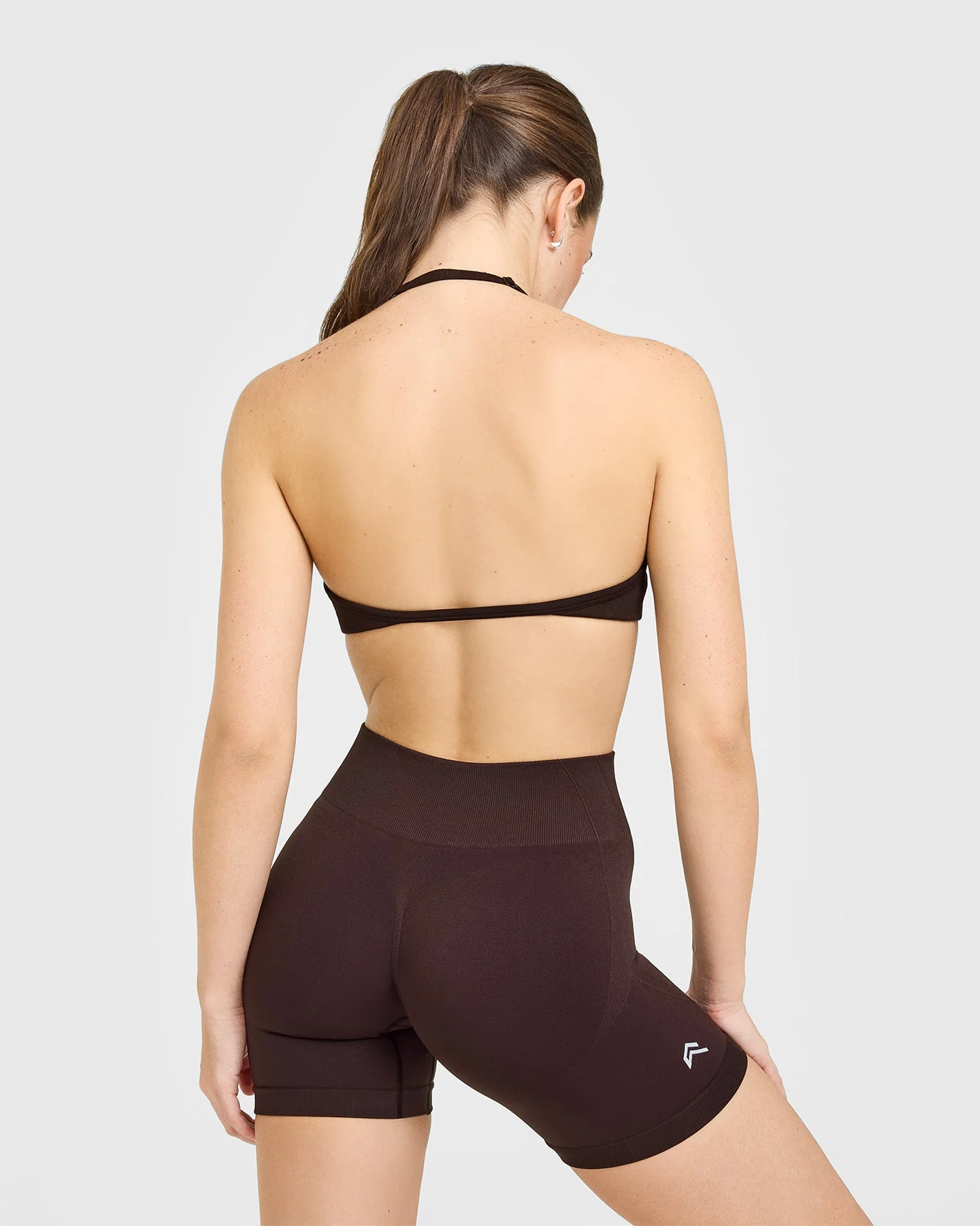 EnhanceLift™ Seamless Minimal Halter Neck Bralette with White Logo | Plum Brown - Image 2
