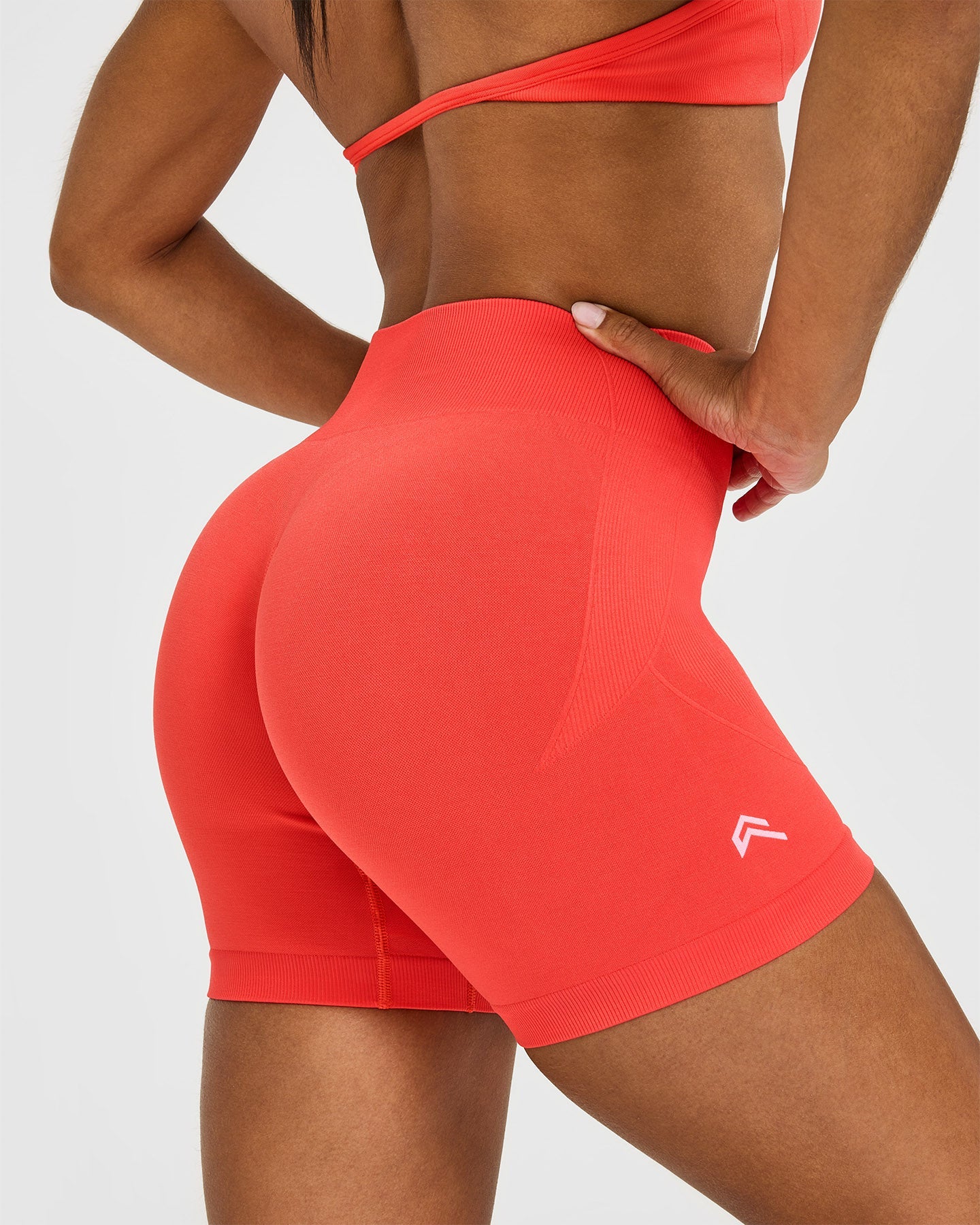 EnhanceLift™ Seamless Shorts with White Logo | Charged Coral - Image 5