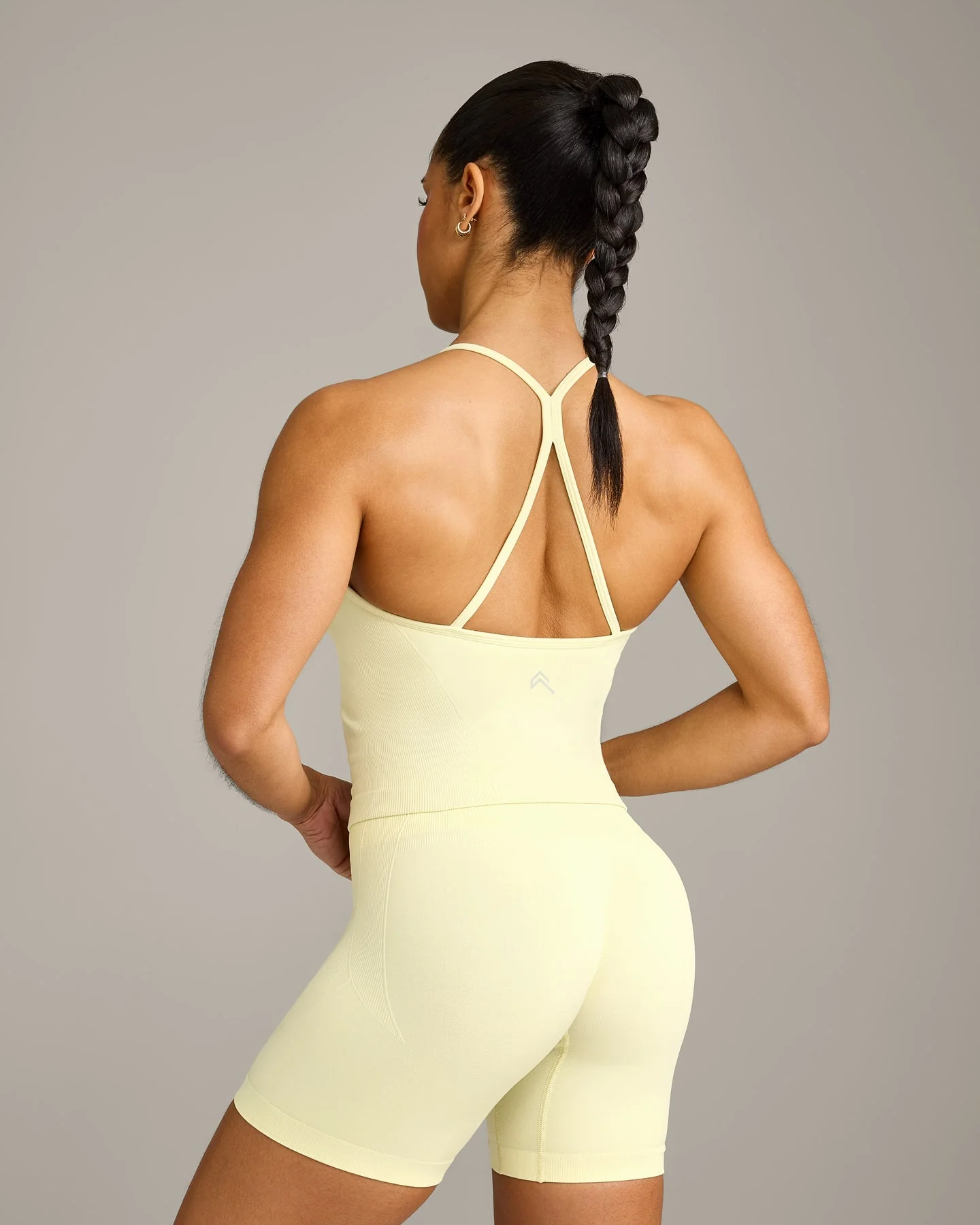 EnhanceLift™ Seamless Strappy Racer Vest with Built in Bra Shelf with Grey Logo | Pastel Yellow - Image 6