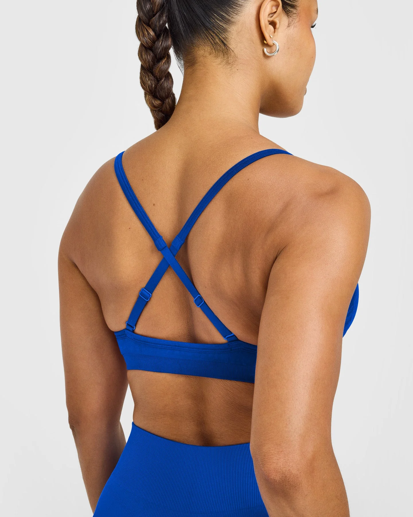 EnhanceLift™ Seamless Strappy Sports Bra with White Logo | Cobalt Blue - Image 4