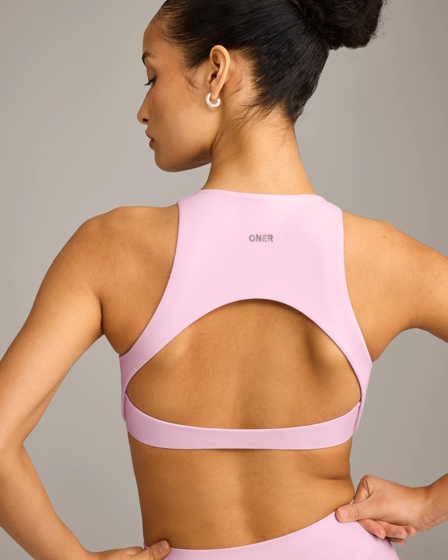 SoftMotion™ High Neck Sports Bra with Grey Logo | Chalk Pink - Image 4