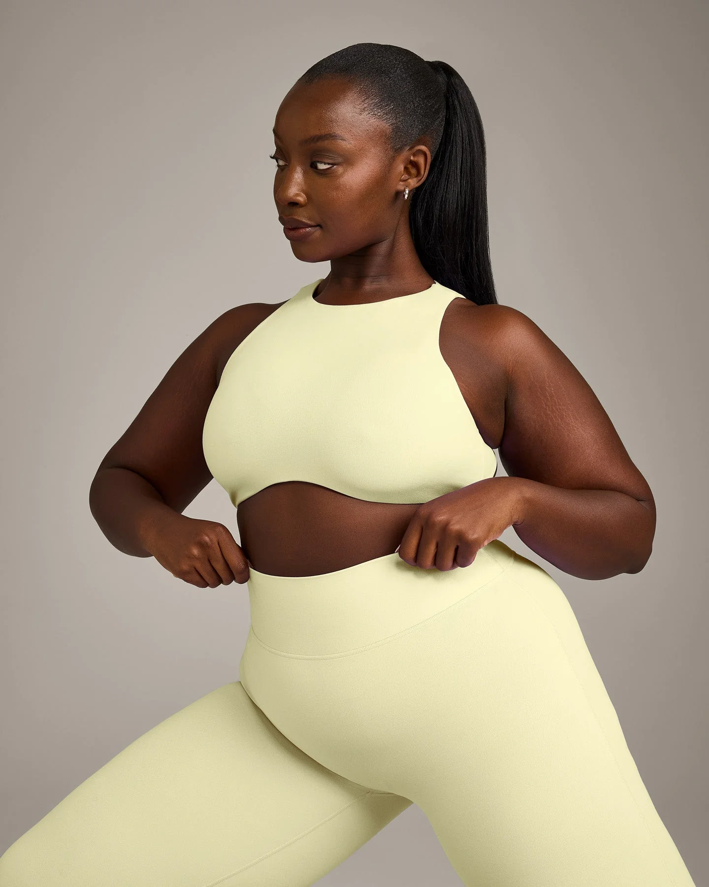 SoftMotion™ High Neck Sports Bra with Grey Logo | Pastel Yellow - Image 4