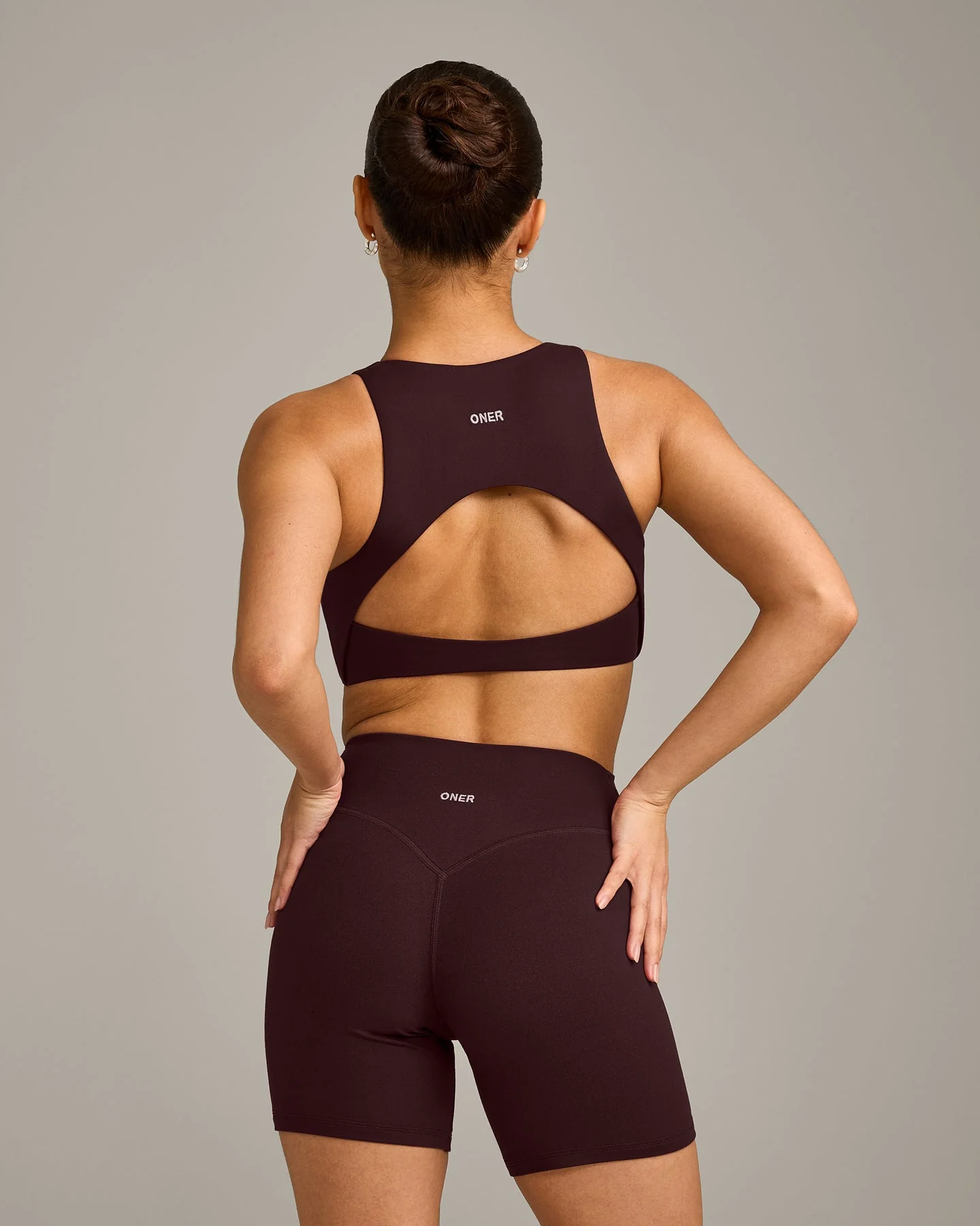 SoftMotion™ High Neck Sports Bra with Grey Logo | Plum Brown - Image 2