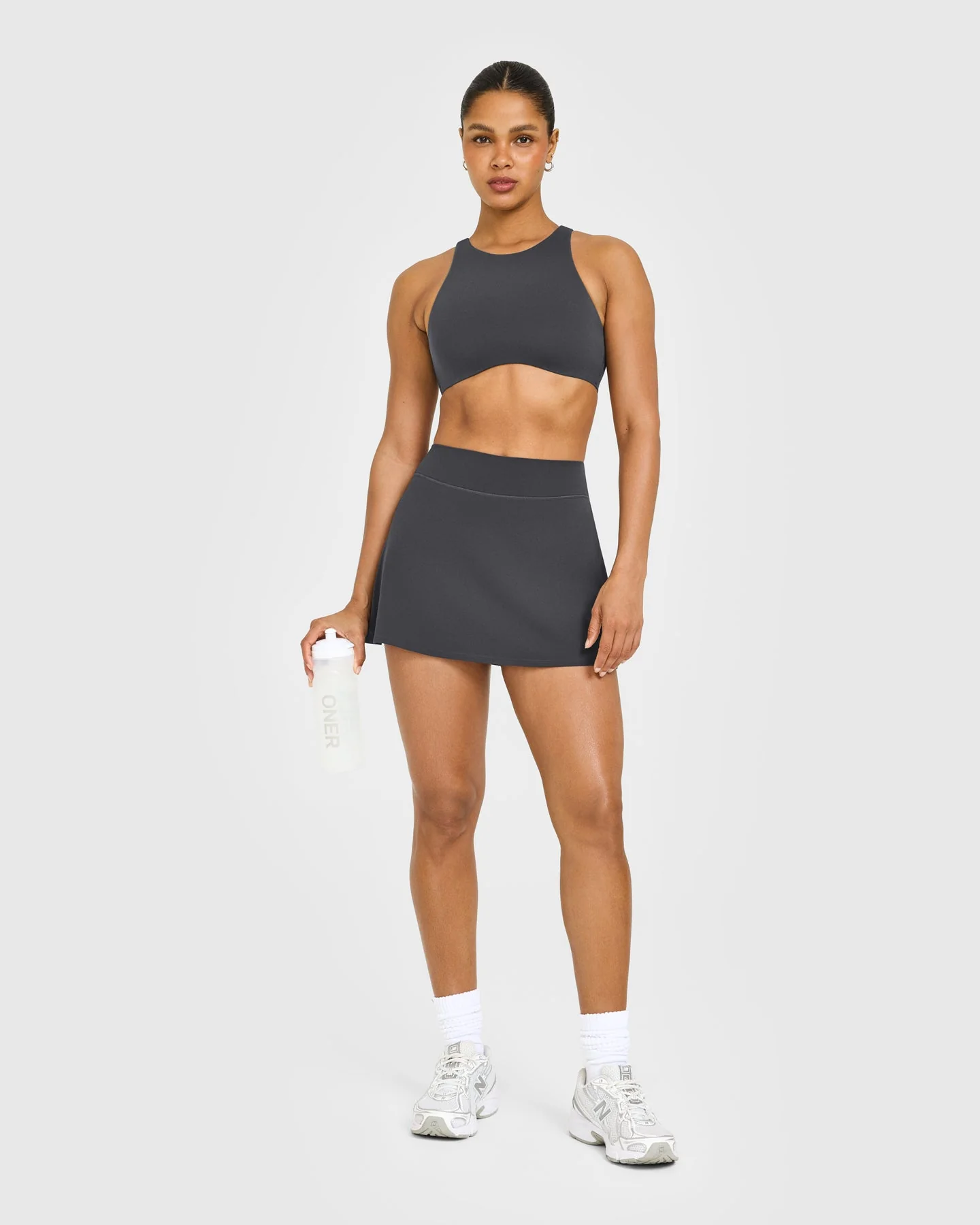 SoftMotion™ High Neck Sports Bra with White Logo | Coal - Image 3