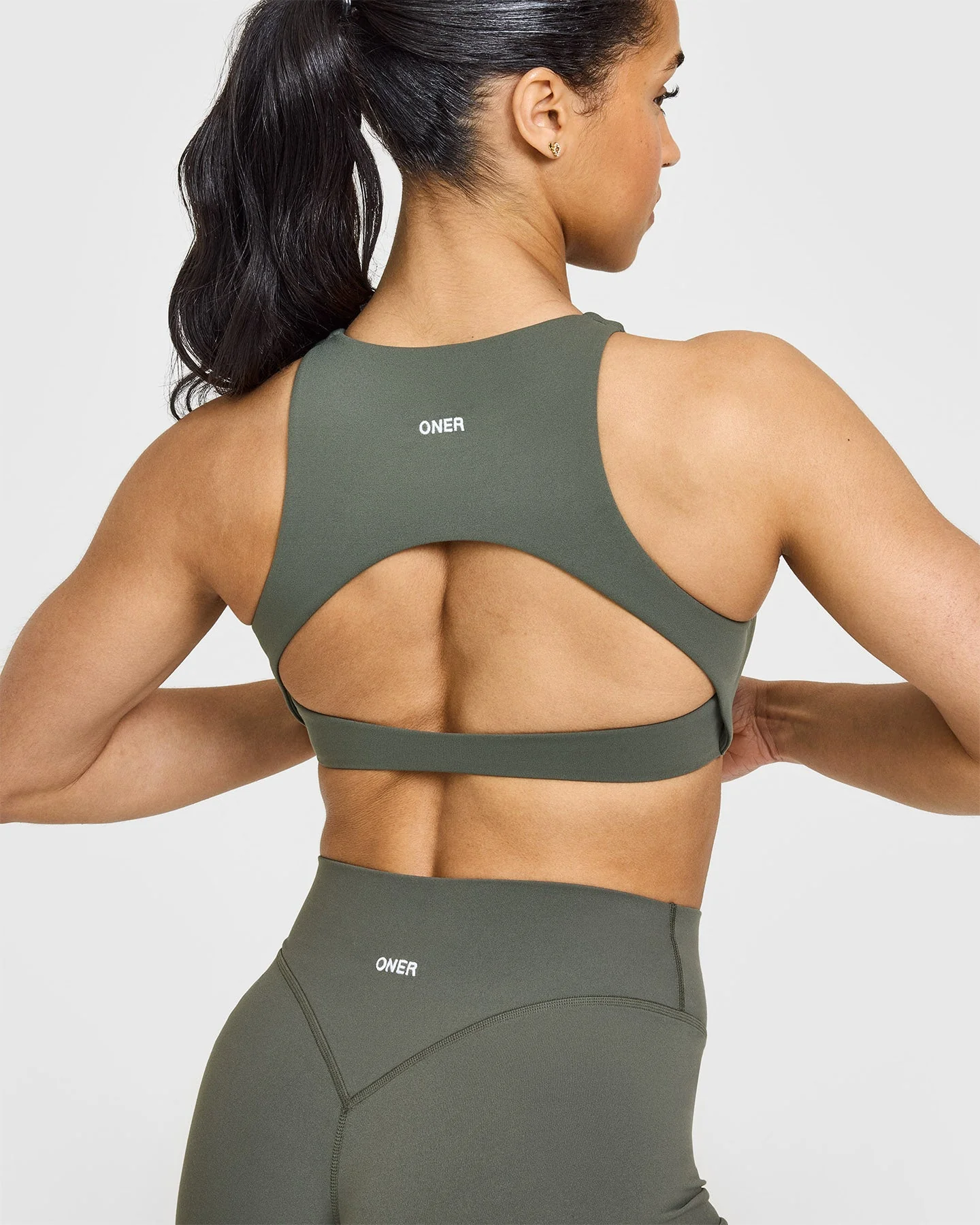 SoftMotion™ High Neck Sports Bra with White Logo | Dark Khaki - Image 4