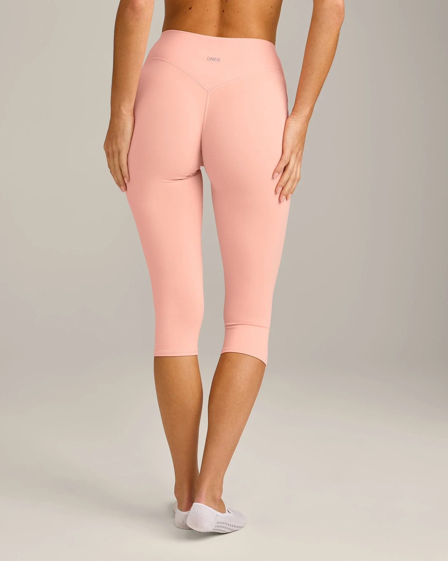 SoftMotion™ High Waisted Capri Leggings with Grey Logo | Peach Orange