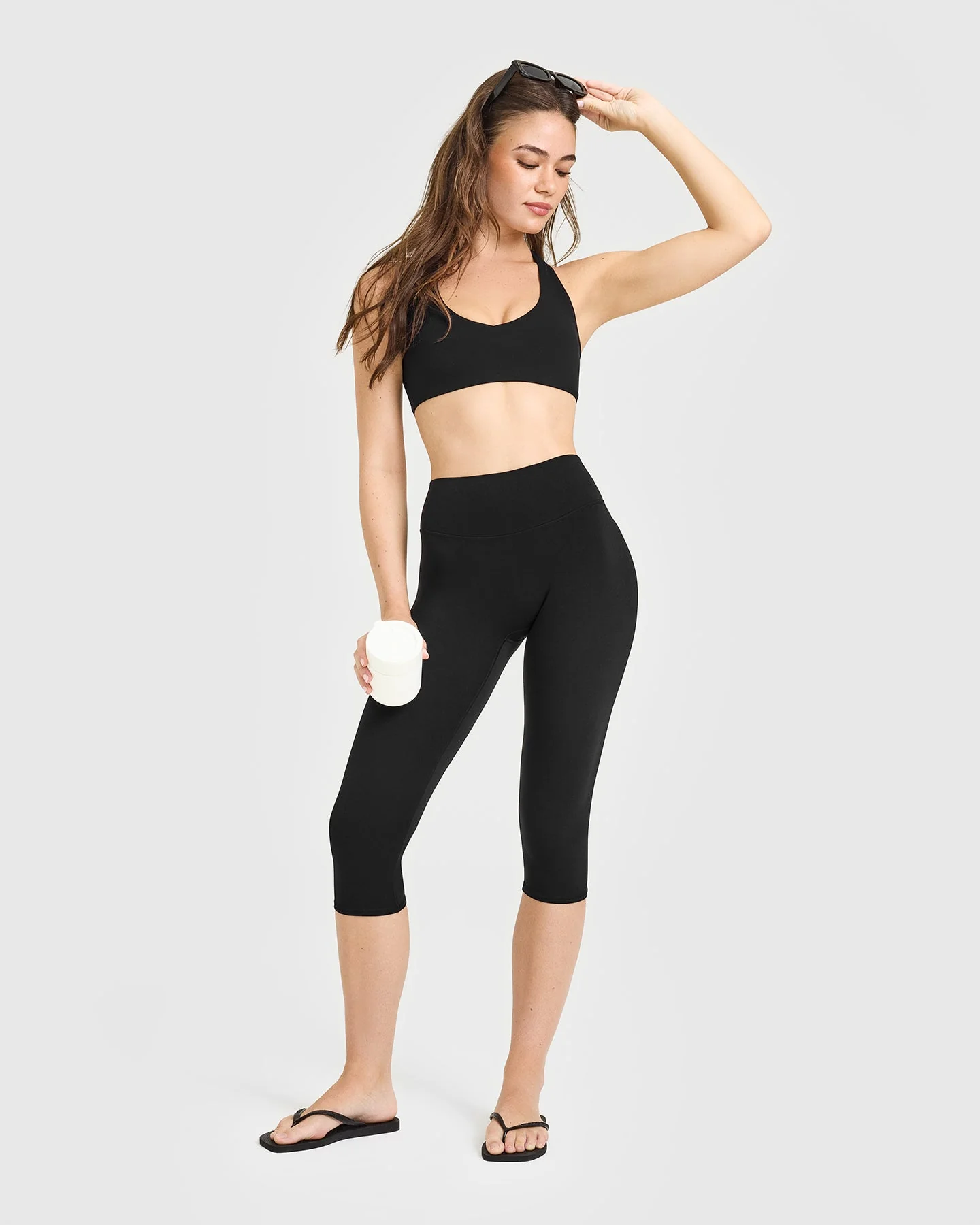 SoftMotion™ High Waisted Capri Leggings with White Logo | Black - Image 3
