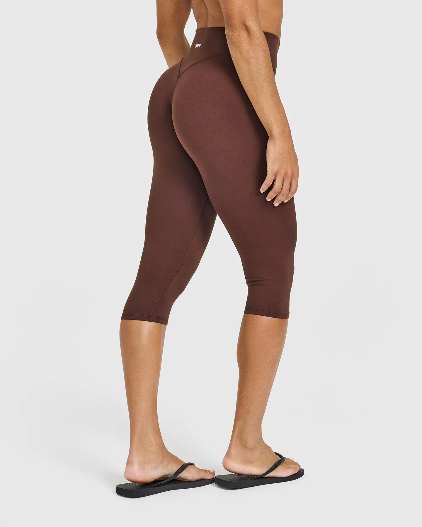 SoftMotion™ High Waisted Capri Leggings with White Logo | Espresso Brown