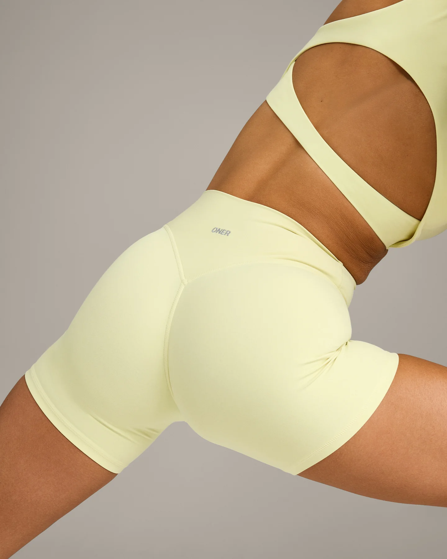 SoftMotion™ High Waisted Shorts 6" with Grey Logo | Pastel Yellow - Image 4