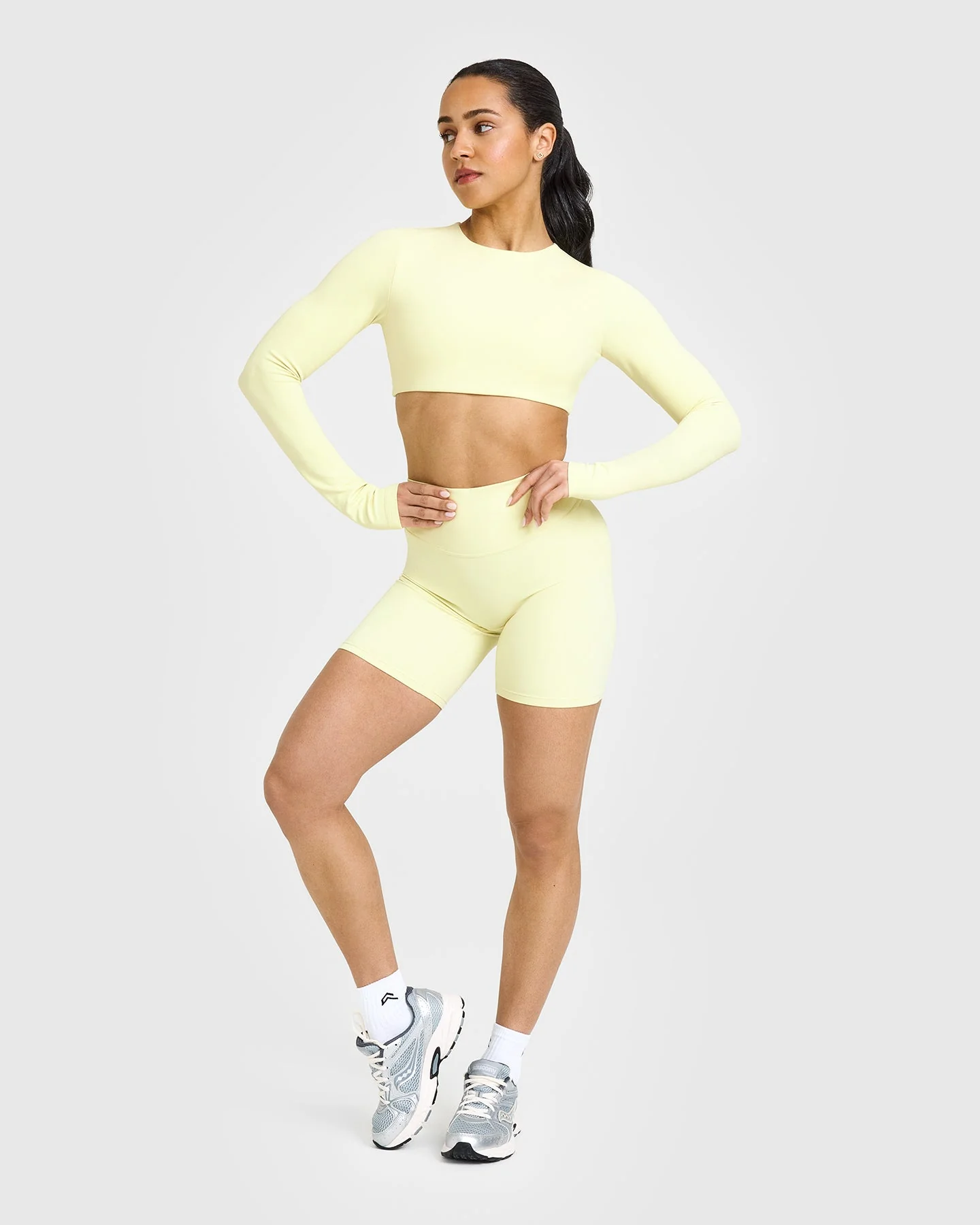 SoftMotion™ Long Sleeve Crop Top with White Logo | Pastel Yellow - Image 3