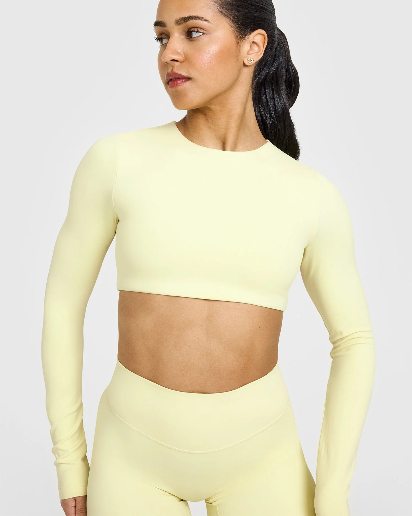 SoftMotion™ Long Sleeve Crop Top with White Logo | Pastel Yellow - Image 5
