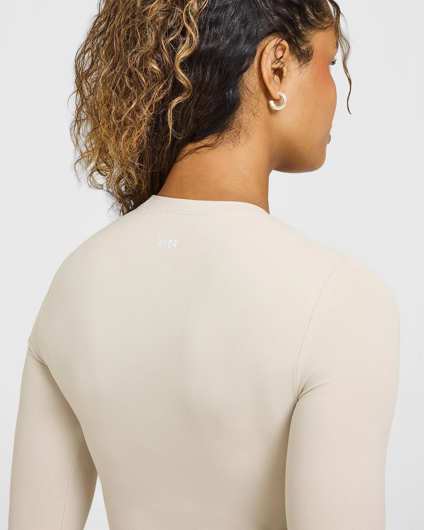 SoftMotion™ Long Sleeve Mid Top with White Logo | Sand - Image 4