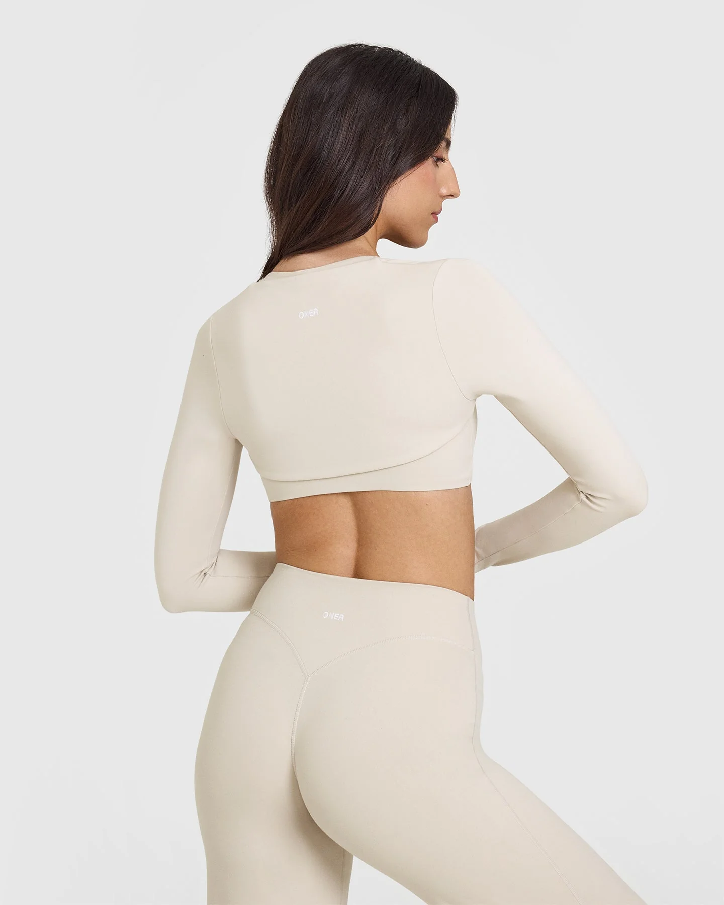 SoftMotion™ Long Sleeve Shrug with White Logo | Sand - Image 2