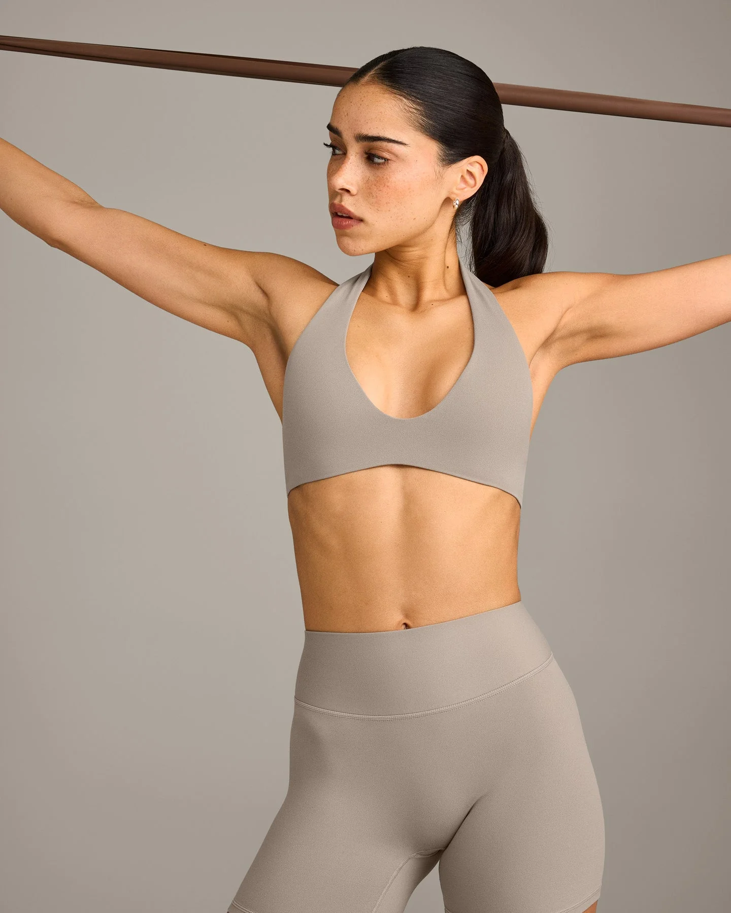 SoftMotion™ Minimal Halter Neck Bralette with White Logo | Warm Sand - Image 4