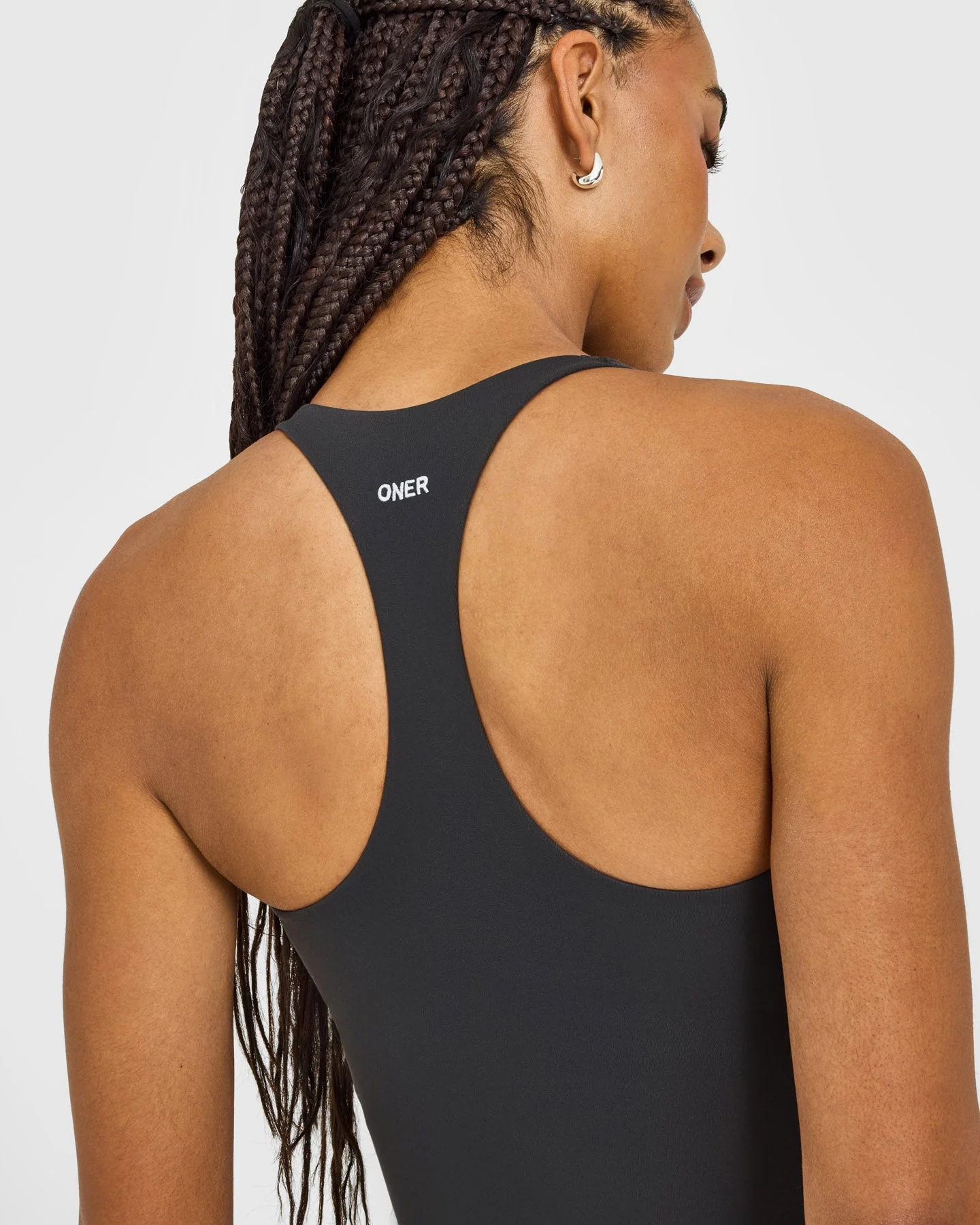 SoftMotion™ Racer Back Mid Vest with Built in Bra Shelf with White Logo | Coal - Image 4