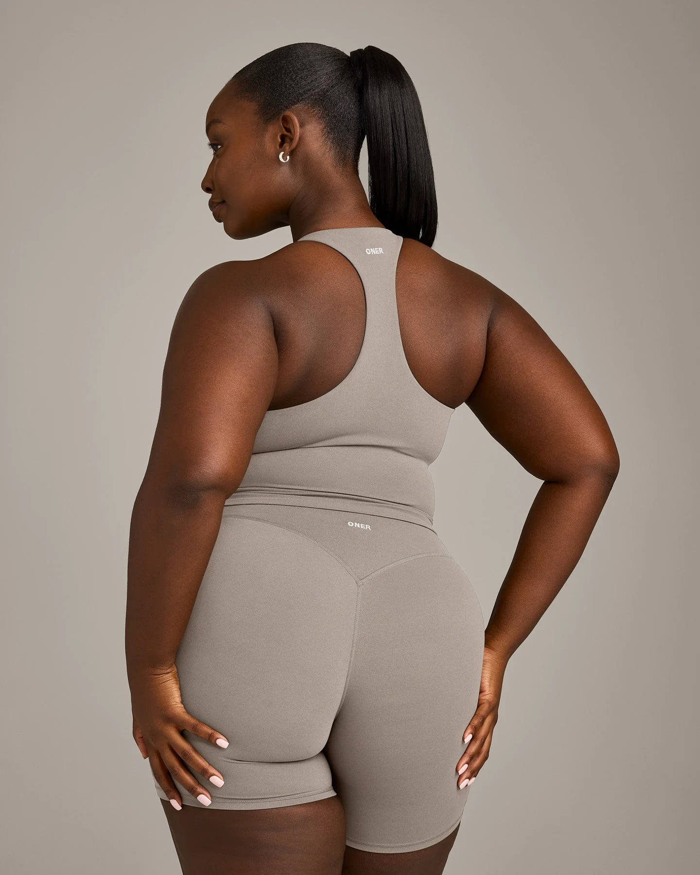 SoftMotion™ Racer Back Mid Vest with Built in Bra Shelf with White Logo | Warm Sand - Image 6