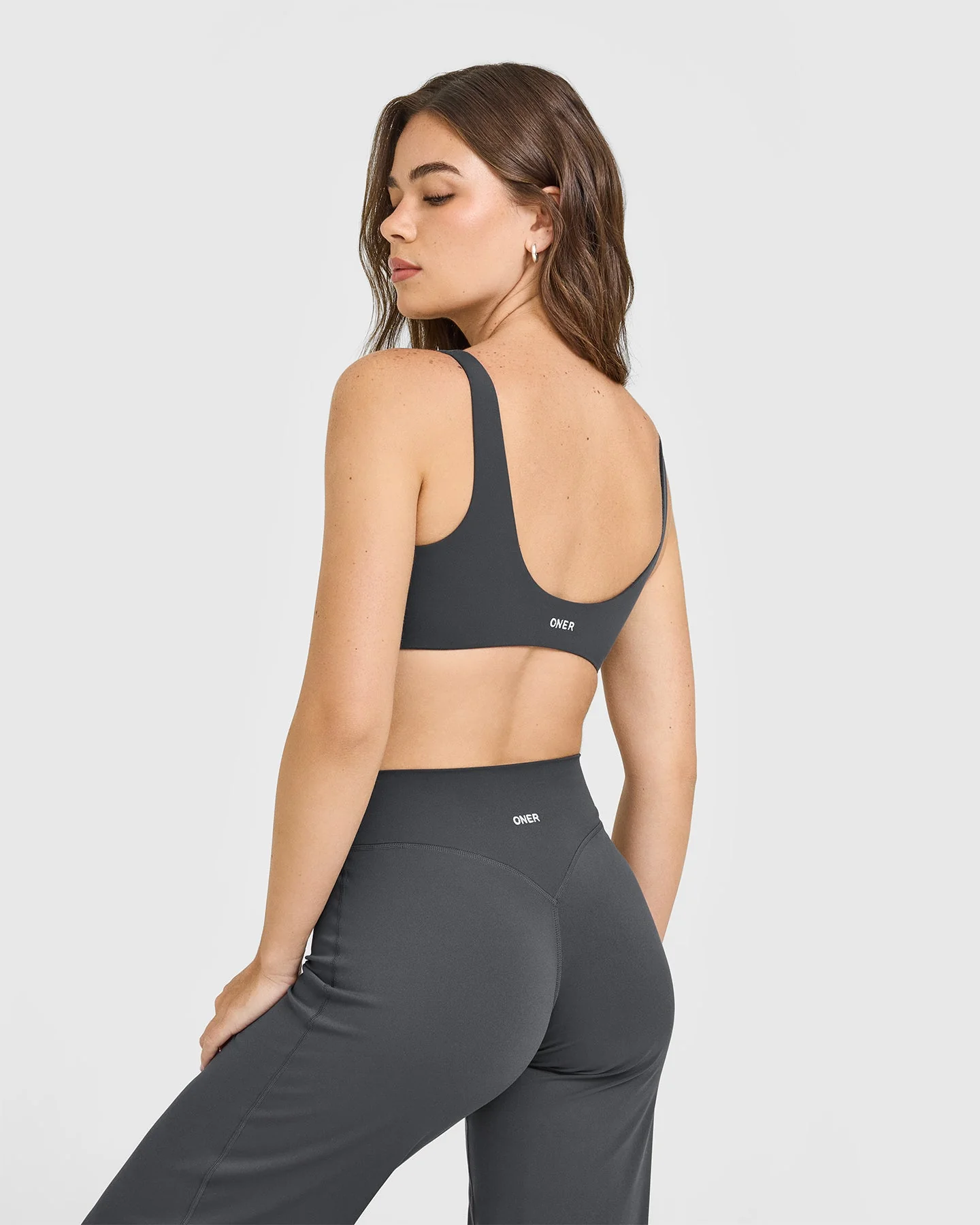 SoftMotion™ Scoop Back Bralette with White Logo | Coal - Image 2