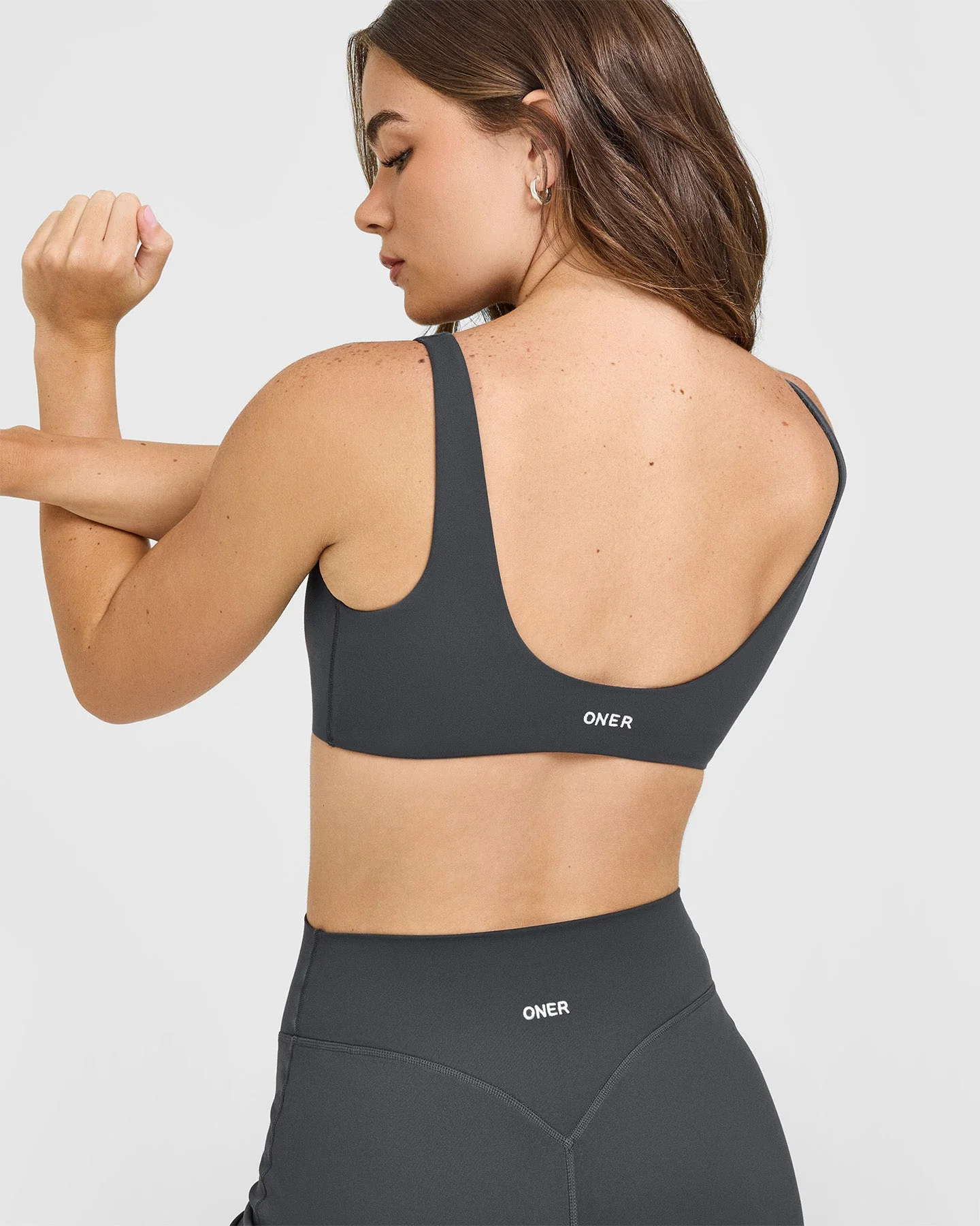 SoftMotion™ Scoop Back Bralette with White Logo | Coal - Image 5
