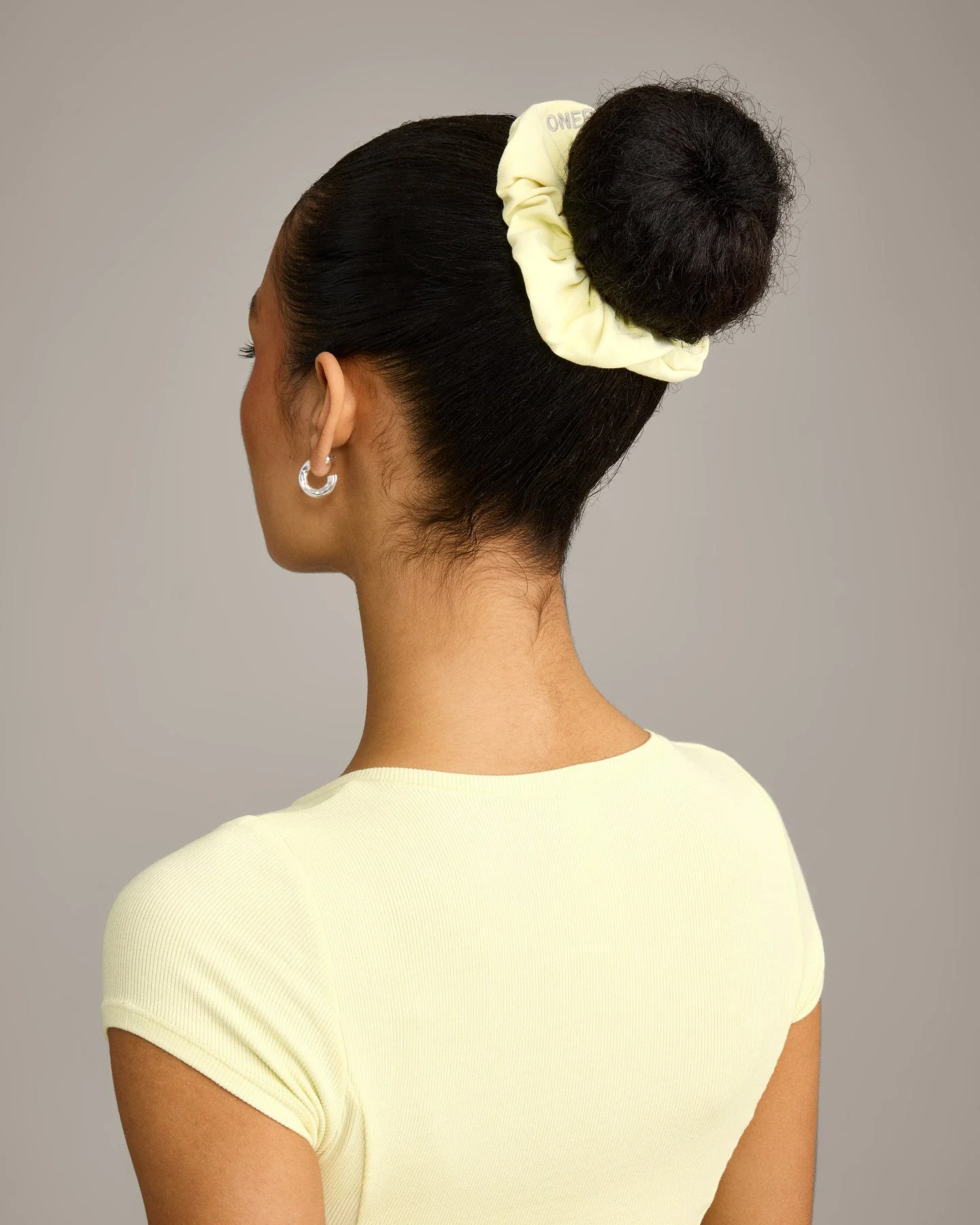 SoftMotion™ Scrunchie with Grey Logo | Pastel Yellow - Image 2