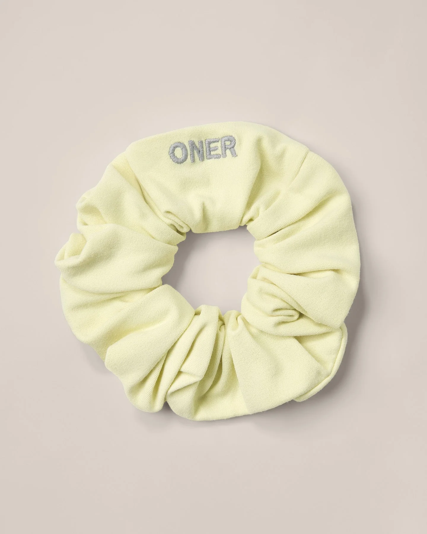 SoftMotion™ Scrunchie with Grey Logo | Pastel Yellow - Image 4