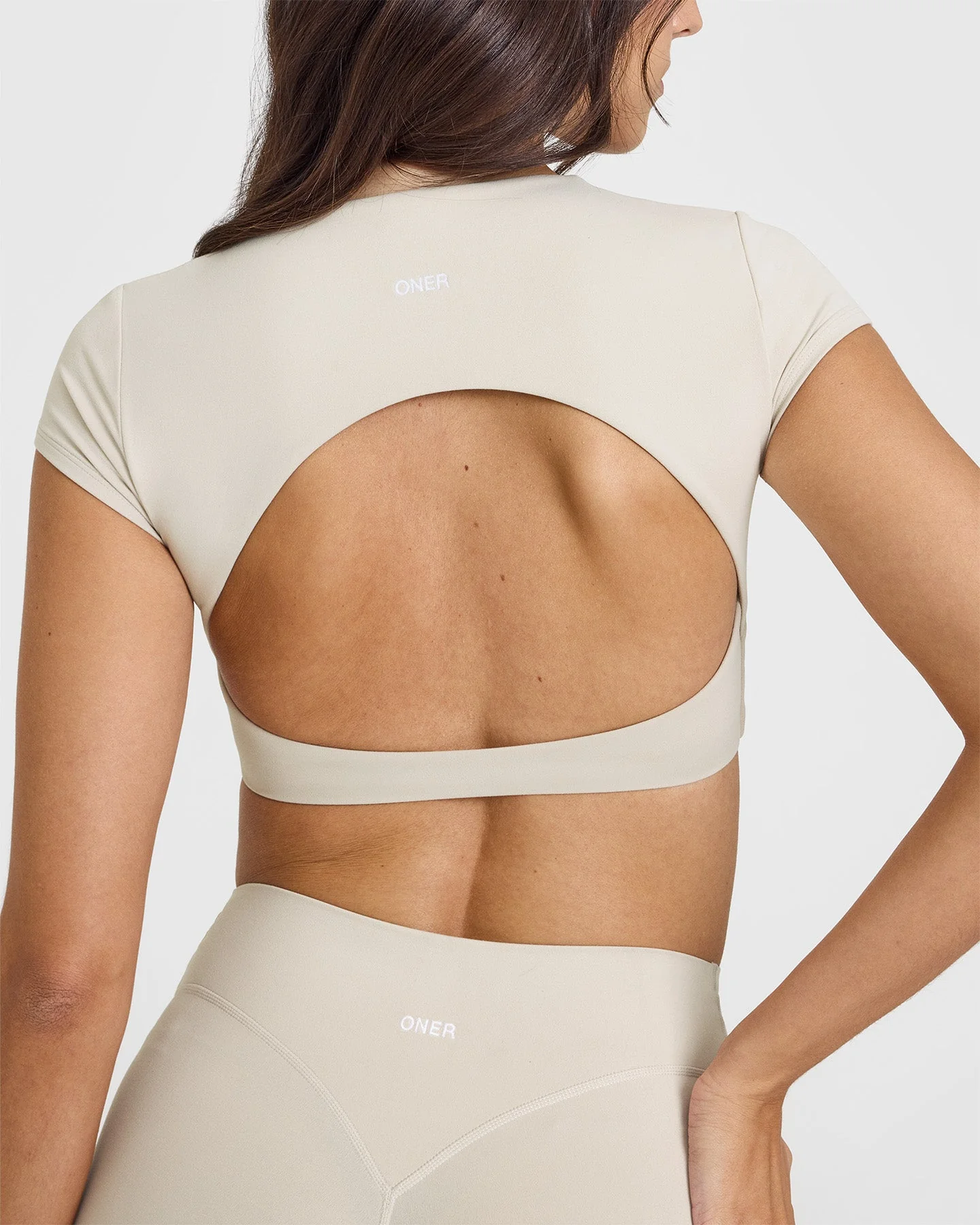 SoftMotion™ Short Sleeve Crop Top with White Logo | Sand - Image 5