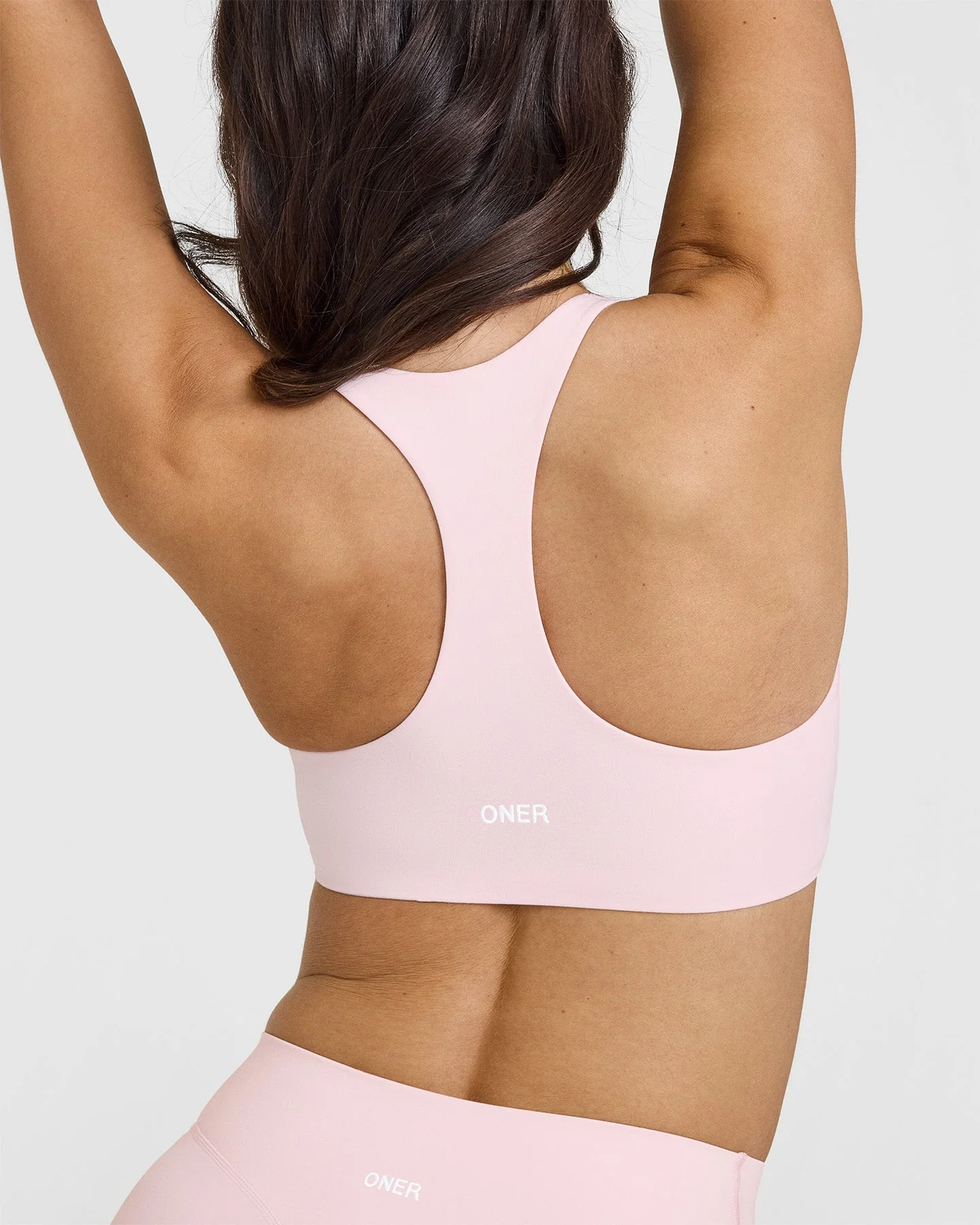 SoftMotion™ Sports Bra with White Logo | Ballet Pink - Image 5