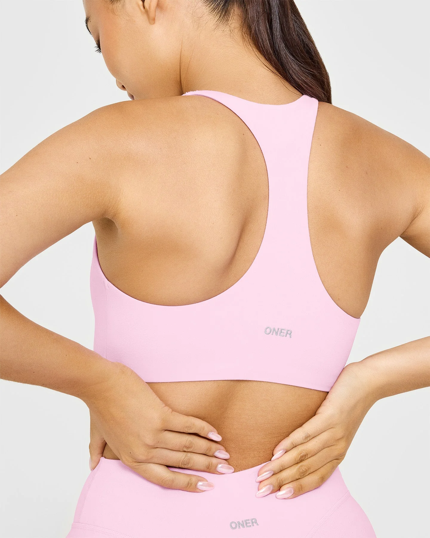 SoftMotion™ Sports Bra with White Logo | Chalk Pink - Image 4