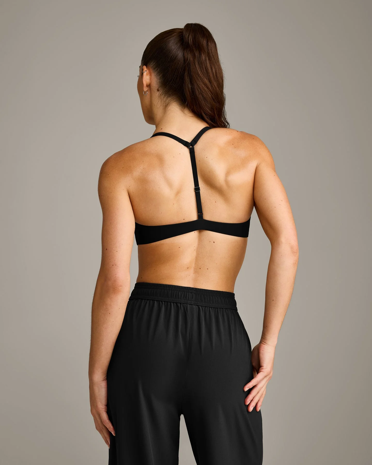 UnifiedMove™ T Back Minimal Bralette with Reflective Logo | Black - Image 2